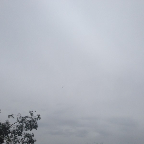 BA289 coming in through overcast Arizona skies.